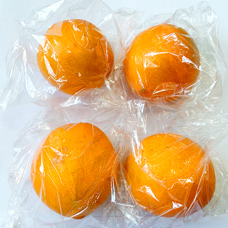 新款全自动水果保鲜膜单果套袋机 橙子柠檬水果包装机